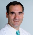 Christopher G · Azzoli MD